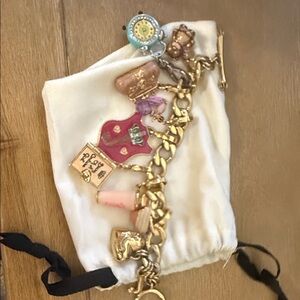 Juicy Couture Gold and Red Charm Bracelet